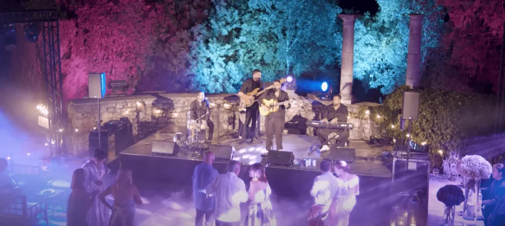 Palco e pubblico che balla · Rumba Gipsy